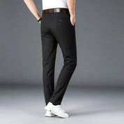 Spring/Summer style: Men's casual pants with a rolled cuff for a laid-back look.