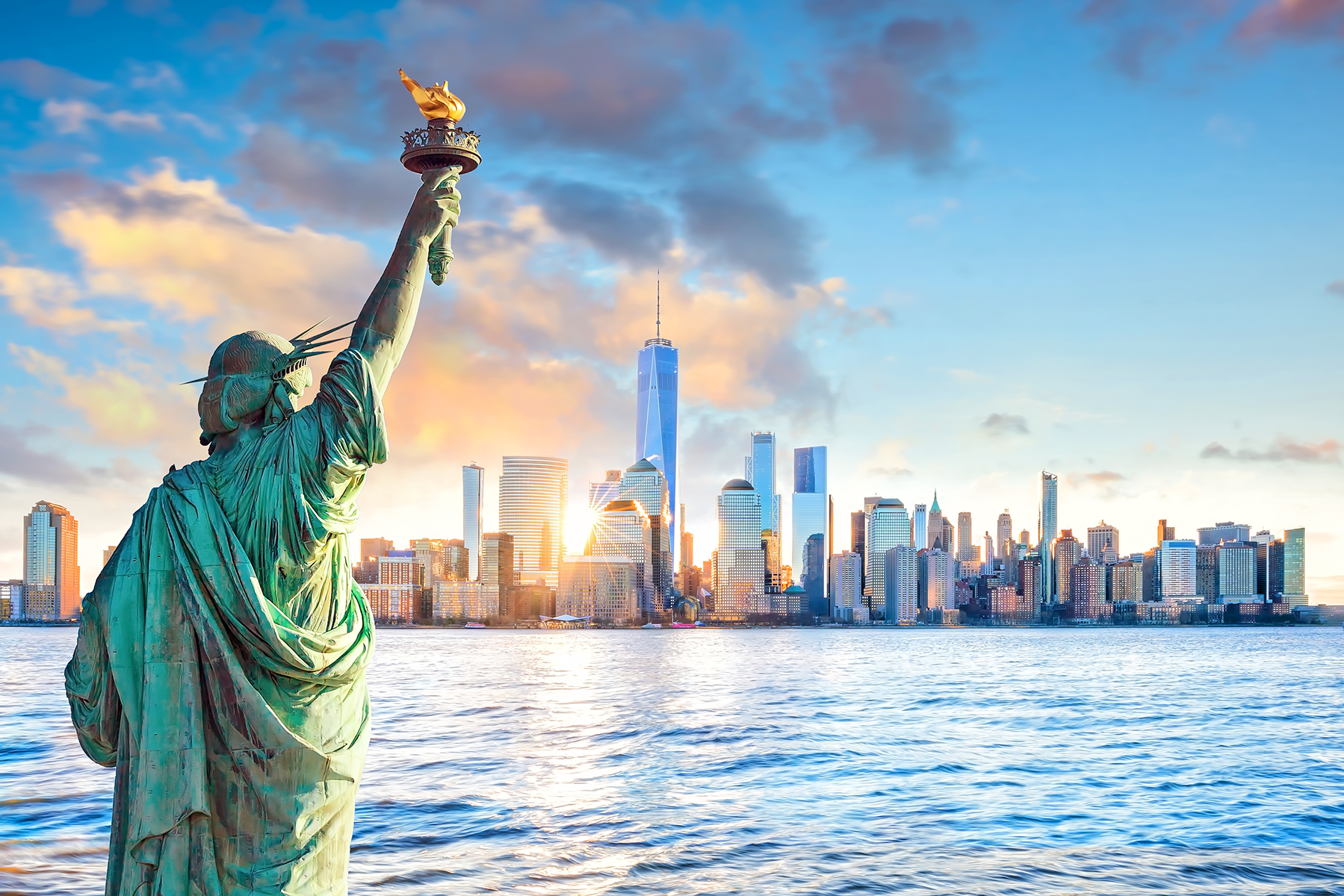 Safinarketny_statue-liberty-new-york-city-skyline-sunset-united-states.png